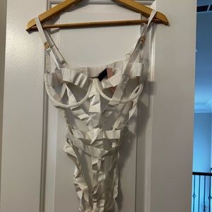 Sexy strappy teddy.  Never worn!  Tags on!